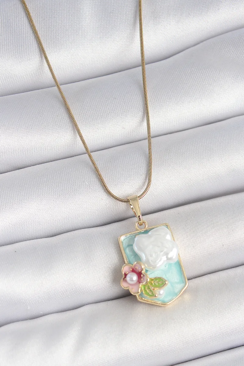 Çelik Gold Renk Mavi İncili Çiçek Kolye